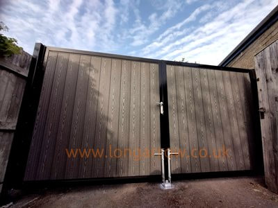 flat top composite metal  garage gate fabrication and fitting in boston spa west yorkshire