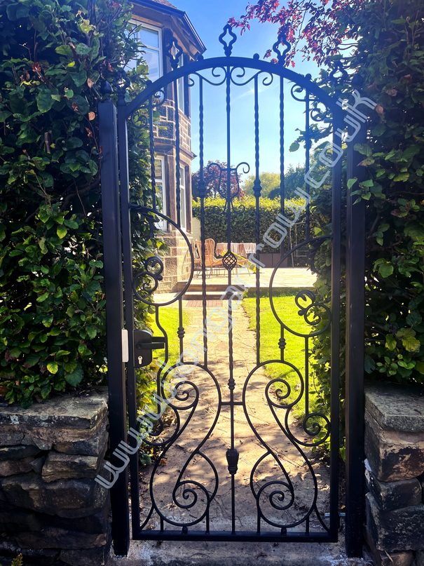 bespoke wrought iron pedestrian access side gate fitted in Horsforth Leeds West Yorkshire
