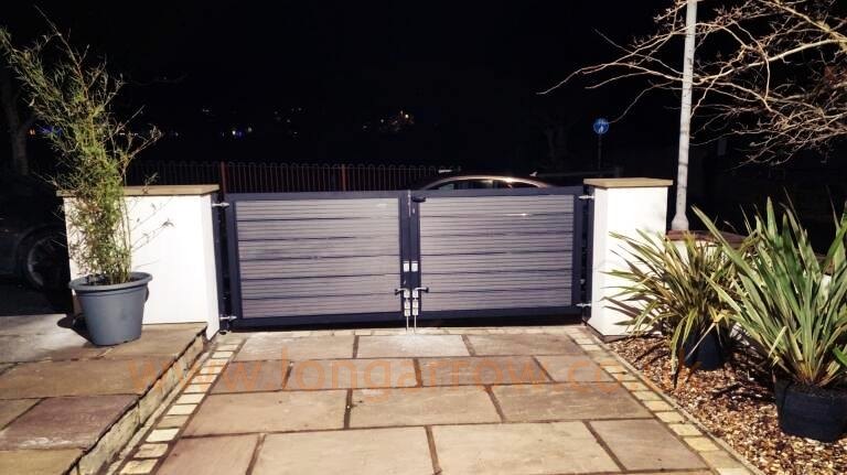 metal gate with grooved grey composite infill fitted