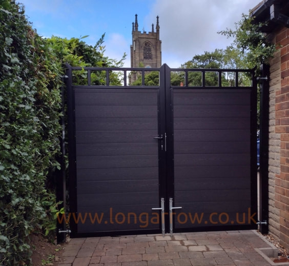 double swing metal gate with charcoal composite board infill