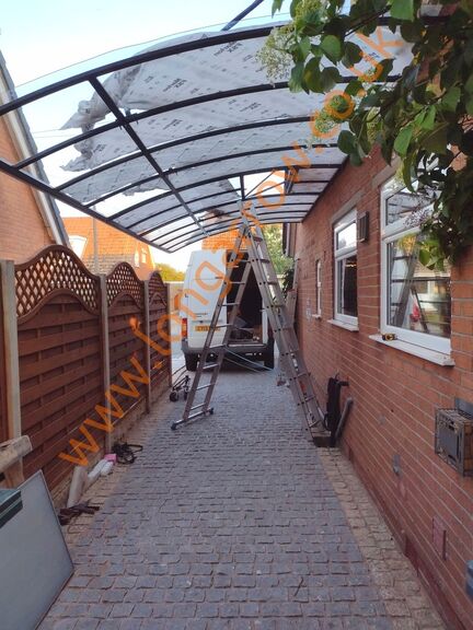 Driveway cantilever see-through carport canopy fitted in Southport Lancashire