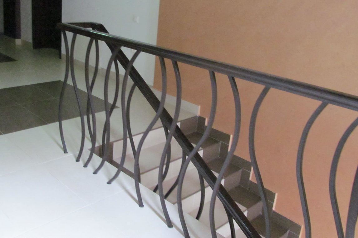 Modern Approach Hand Interior Curved Metal Railings