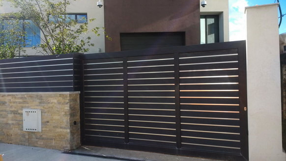 composite board and aluminium plated sliding gates leeds