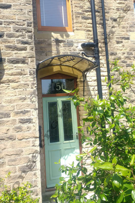 wrought iron door canopy - Sheffield installation