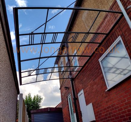 see-through glass-like pillar-less carport canopy and patio canopy fitted in leeds with no pillars