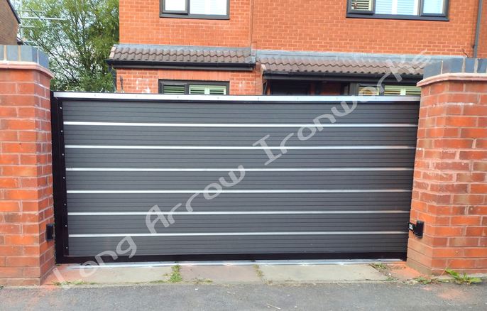 Contemporary automatic sliding gate fitted in Manchester