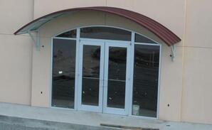curved store entrance canopy
