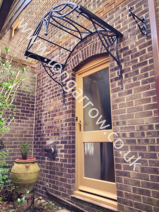 wrought iron art door canopy uk