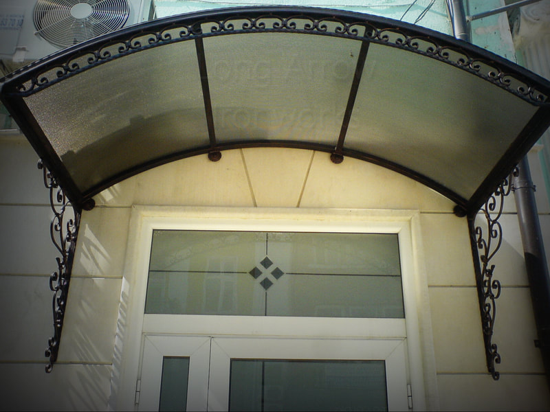 wrought iron entrance canopy