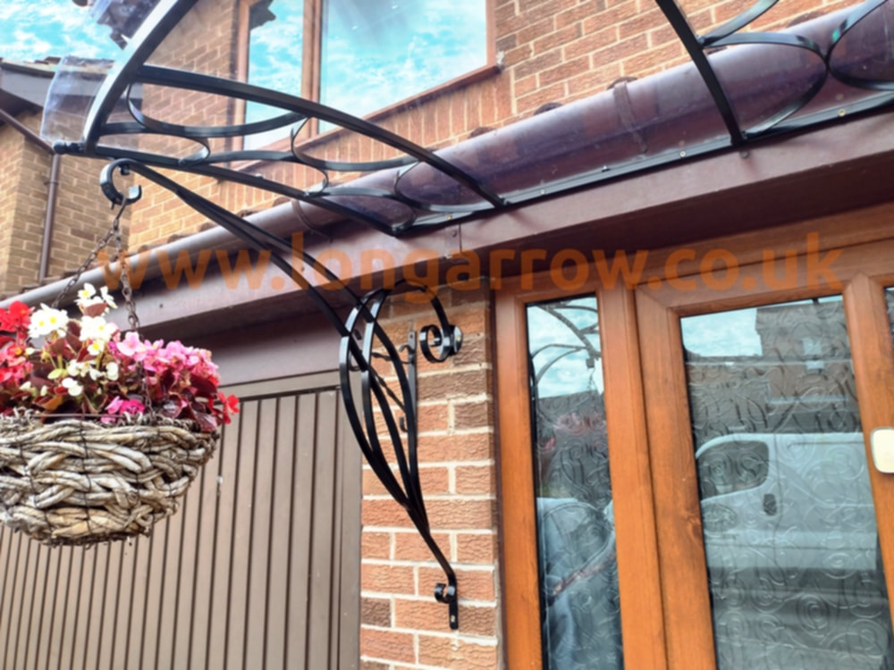 wrought iron awning - porch canopy details 
wf