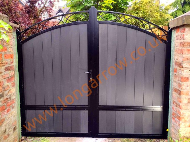 Metal double swing gate with wrought iron details and brushed grey composite infill, fitted in York